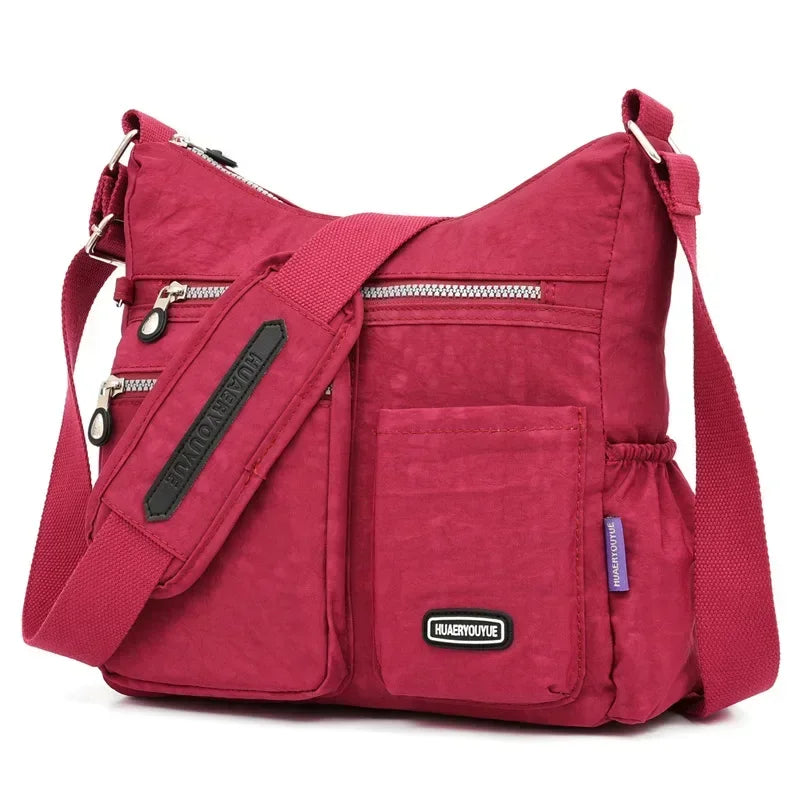 Multi-Pocket Nylon Crossbody Bag | Padded Adjustable Strap | Braviixx