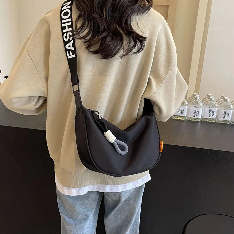 2026 New Fashion Crossbody Bag Simple Wide Shoulder Strap Design Single Shoulder Bag Original Style Commuting Dumpling Women Bag