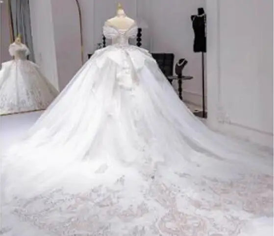 Off-Shoulder Ball Gown Wedding Dress | Beaded Lace | Braviixx