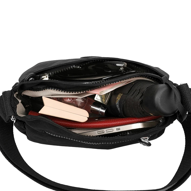 Women's Lightweight Water-Resistant Nylon Crossbody Bag | Front Zip Pocket | Adjustable Strap | Casual Everyday | Black · Burgundy · Pink · Beige